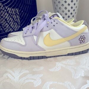 I AM SELLING PURLE ,YELLOW AND BROWN NIKES